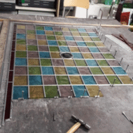 stained glass window being repaired and restored