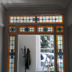 bespoke stained glass windows around door frame