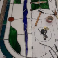 Stained glass window repair in workshop Stained glass window repair in workshop