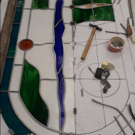 stained glass window repair in workshop