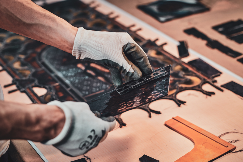 restorer is choosing right peace of stained glass for his project